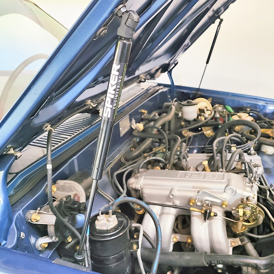 Spiker Engineering hood struts installed in a Toyota 4Runner engine bay