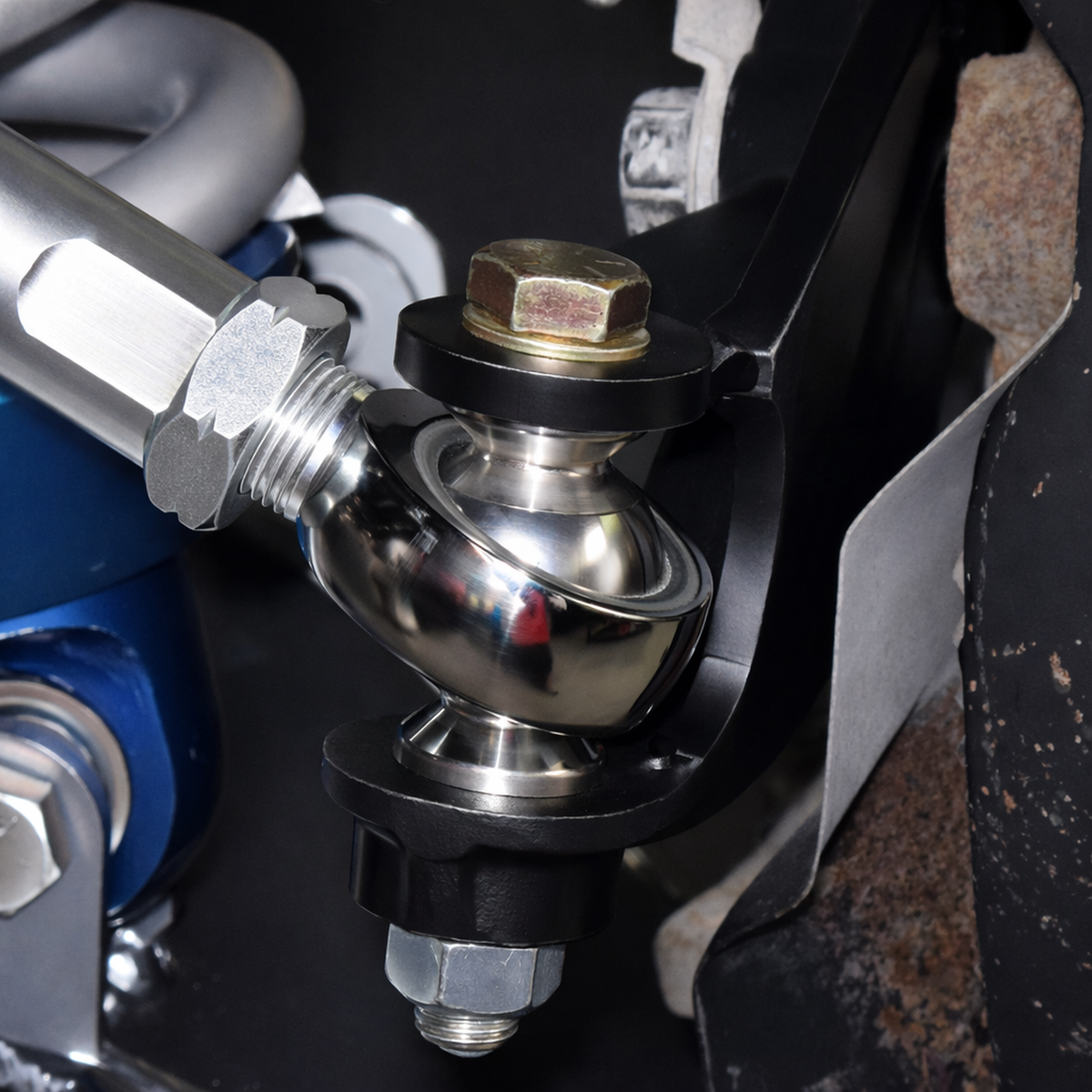 Total Chaos heim joint tie rod installed at the outer steering arm connection