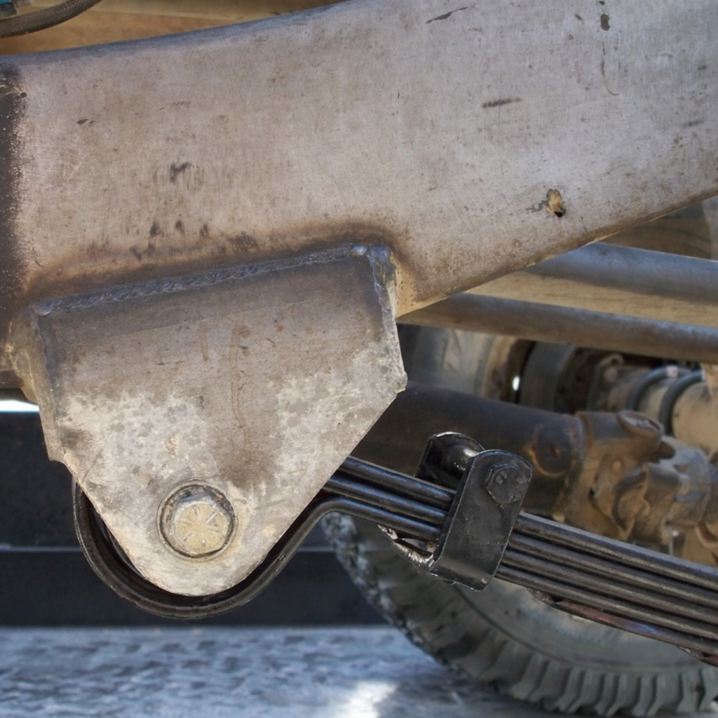 Total Chaos weld-on leaf-spring hanger suspension component